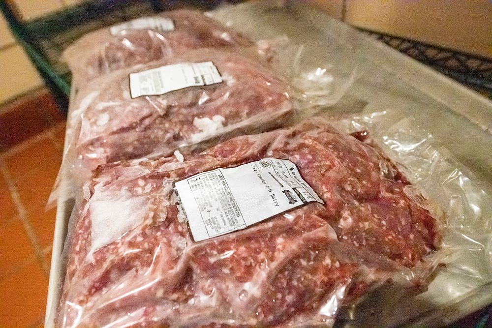 Locally sourced meat in plastic package.