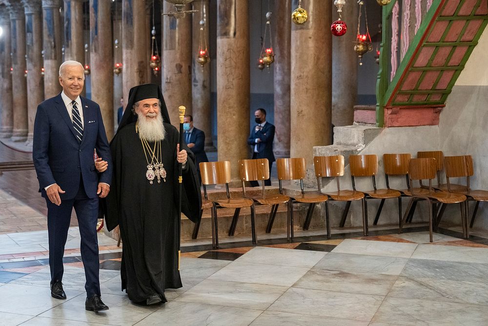 President Joe Biden stops at the Greek Orthodox Altar with Patriarch Theophilos III, Friday, July 15, 2022, at the Church of…