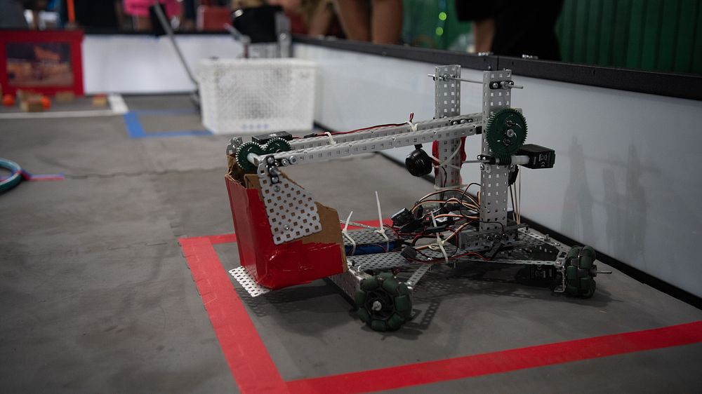 Young man and woman from Maryland, all under 18 years old, compete in a robotics challenge at the 2022 Maryland State Fair…