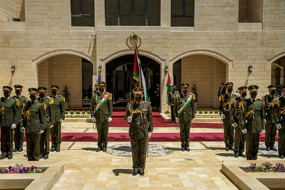 An honor guard stands at attention as President Joe Biden participates in an arrival ceremony with Palestinian Authority…