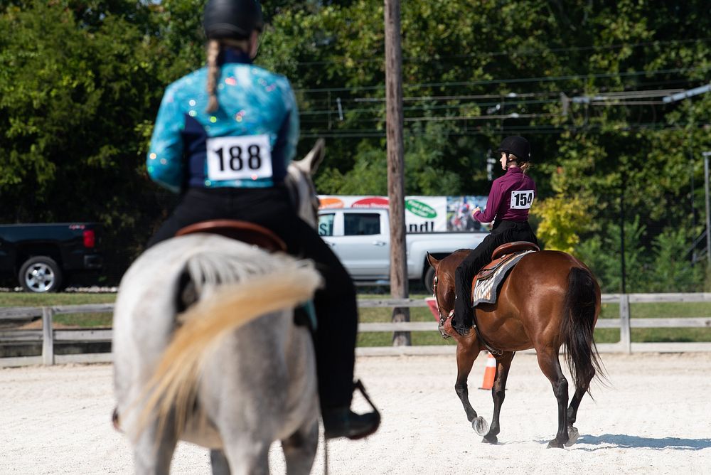 Young men and women, 14-18 years old and all in the 4-H program, compete in a Western Show at the 2022 Maryland State Fair…