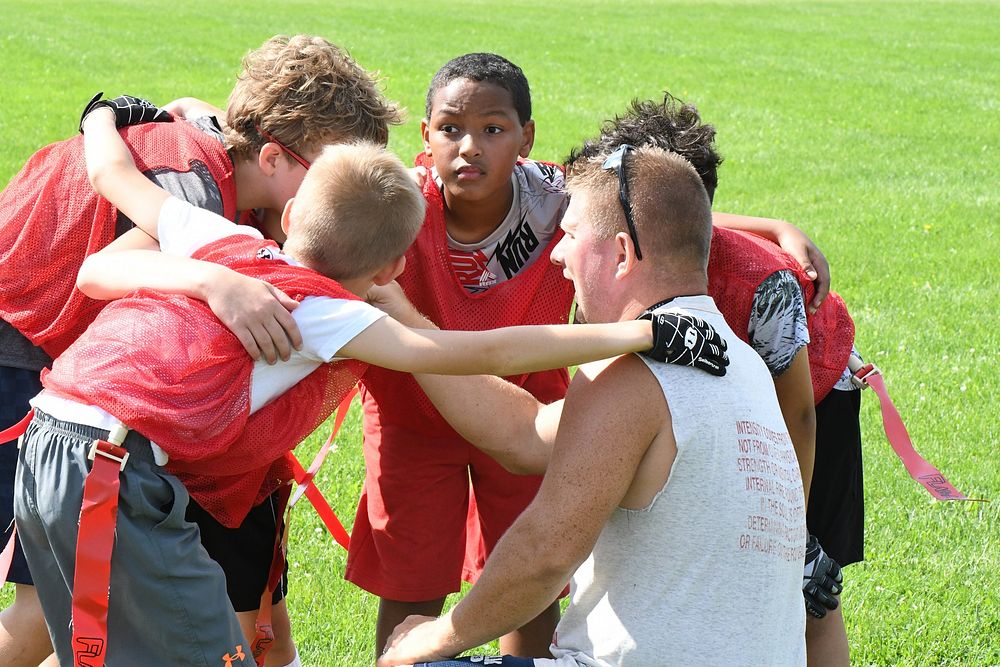 CYS Flag Football_16The Fort Drum Child and Youth Services’ Sports and Fitness Summer Camps program offered a variety of…