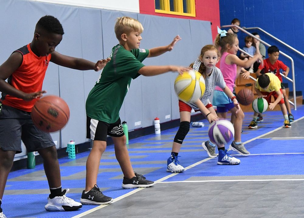 CYS Basketball Camp_04The Fort Drum Child and Youth Services’ Sports and Fitness Summer Camps program offered a variety of…