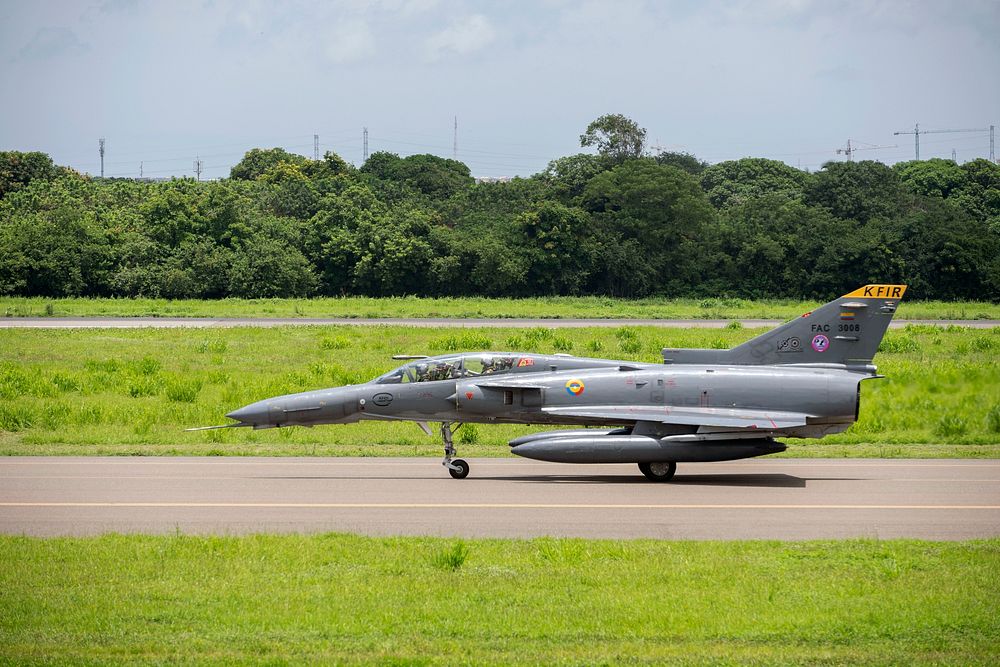 SCANG participates in Relampago VIIA Colombian Air Force KFIR fighter jet taxies on the runway while participating in…