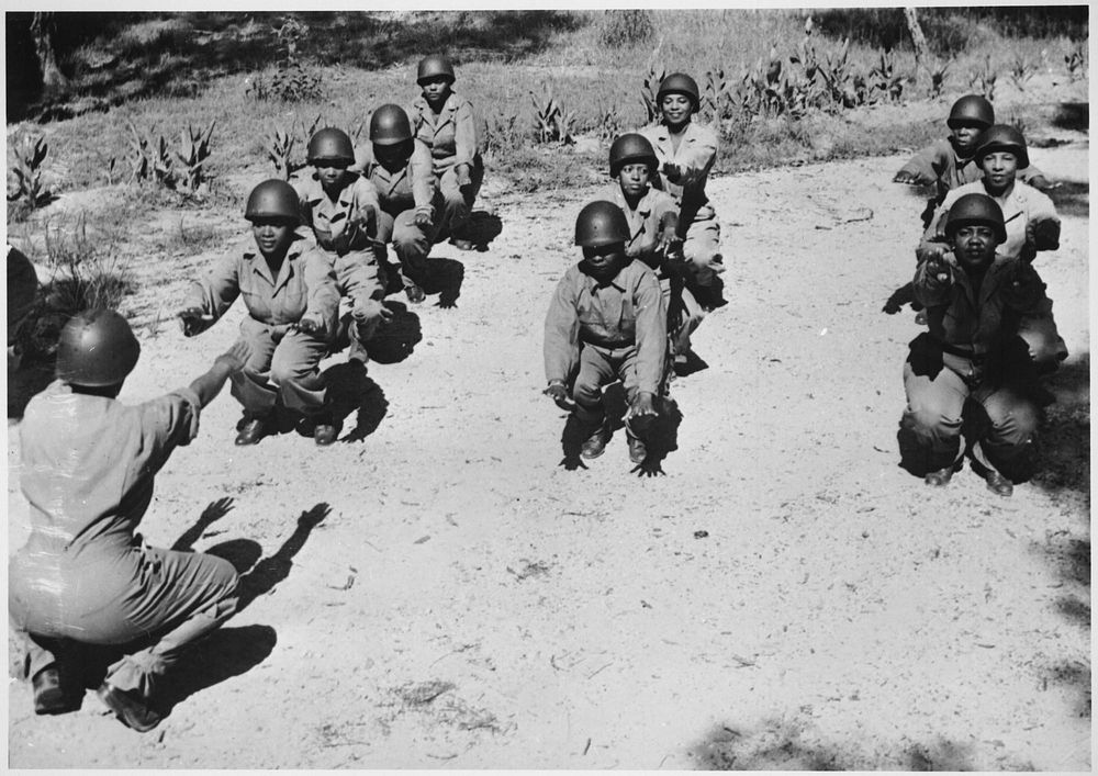 American Negro nurses, commissioned second lieutenants in the U.S. Army Nurses Corps, limber up their muscles in an early…