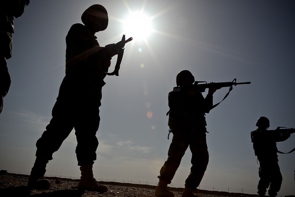 Afghan National Army (ANA) soldiers rehearse sighting in on their targets from the standing position while learning proper…