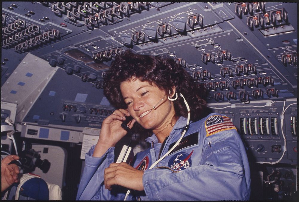 (Sally Ride) America's first woman astronaut communicates with ground controllers from the flight deck during the six day…