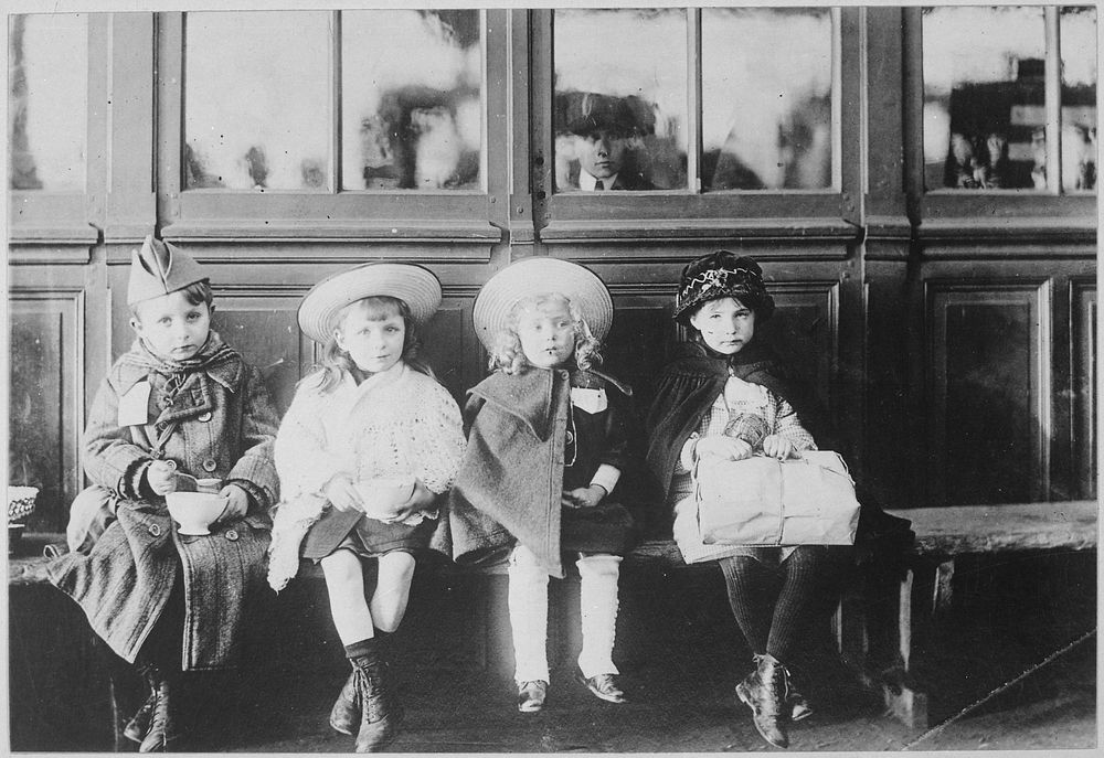 French Refugee Children. While waiting for train, children were fed with bread and milk from American Red Cross soldiers…