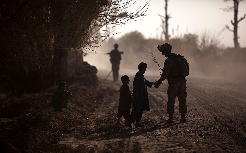 KUCHINEY DARVISHAN, Helmand province, Afghanistan — U.S. Marine Sgt. Jeremy Holsten, a 25-year-old squad leader with 3rd…