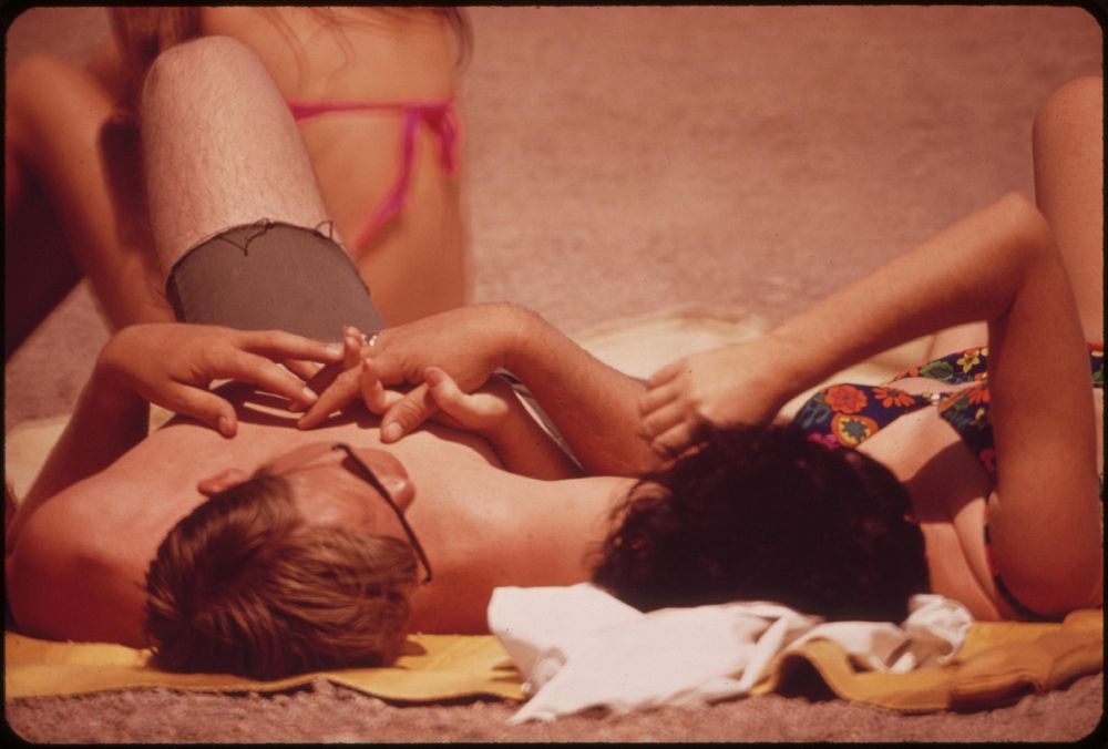 Sunning on the lake shore, May 1972. Photographer: O'Rear, Charles. Original public domain image from Flickr