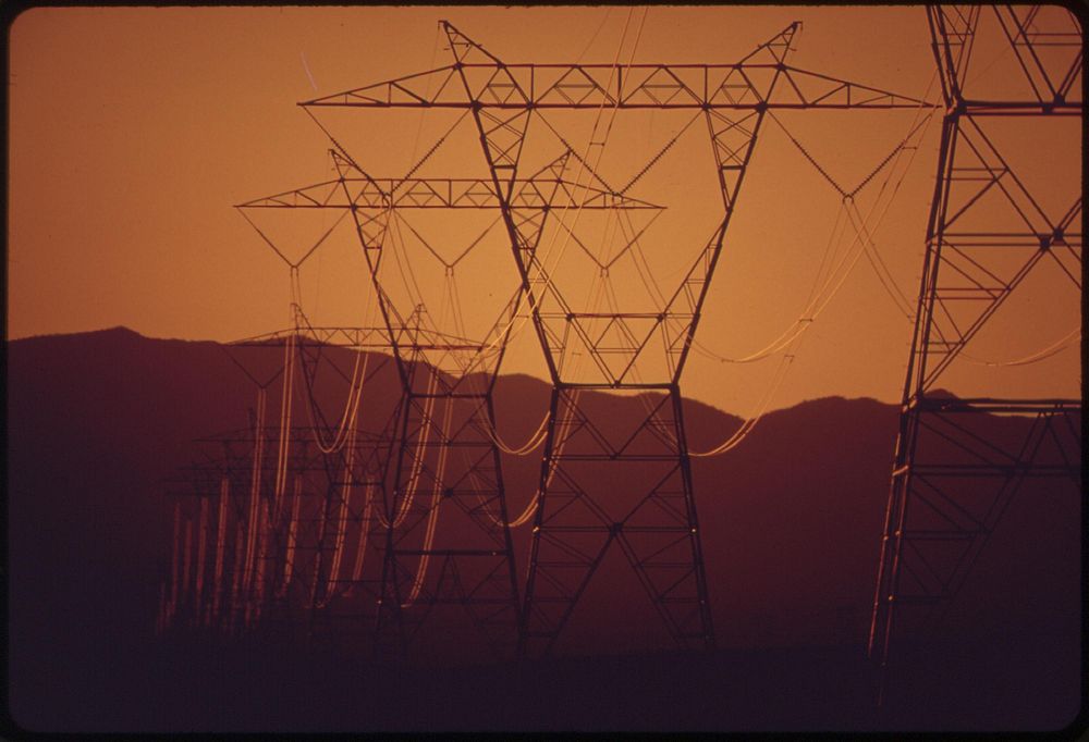 Power lines pass from nearby Hoover Dam to southern California, May 1972. Photographer: O'Rear, Charles. Original public…