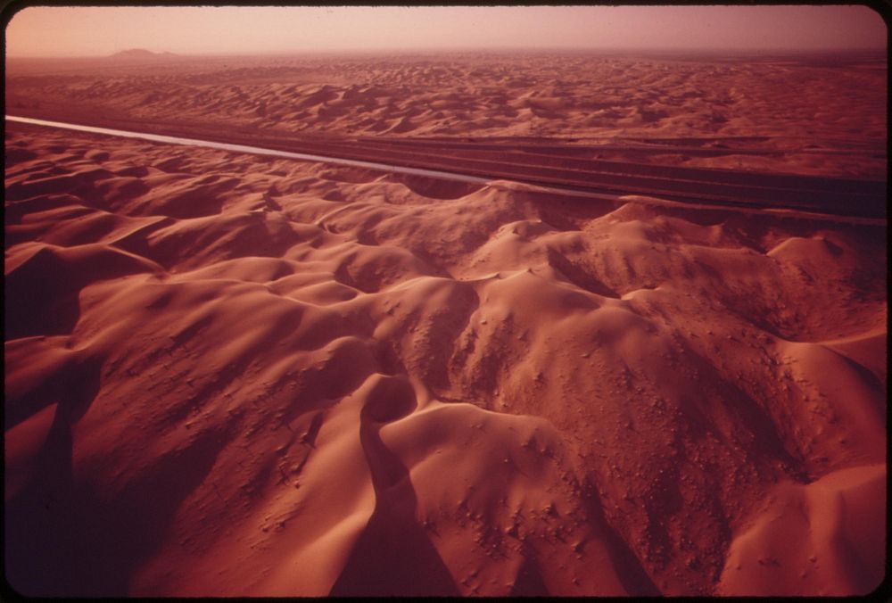 The All-American Canal carries Colorado River water through the sand dunes of the western part of the Imperial Valley, May…