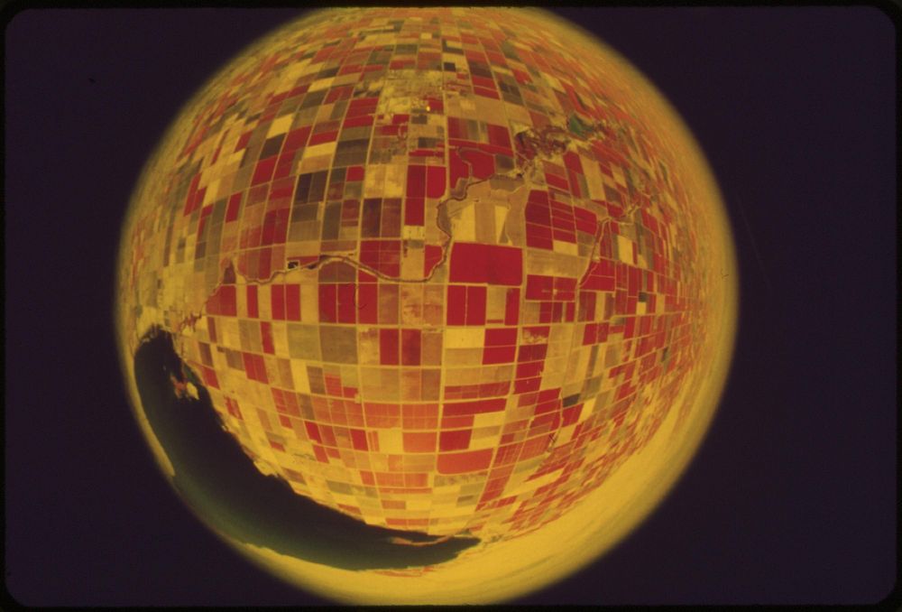 Fish-eye shot of Imperial Valley. Salton Sea at edge of picture, May 1972. Photographer: O'Rear, Charles. Original public…