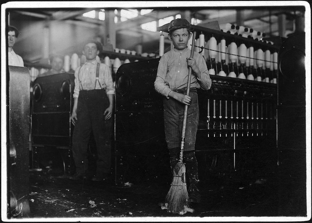 Young sweeper working in Anniston Yarn Mills. Anniston, Ala, November 1910. Photographer: Hine, Lewis. Original public…