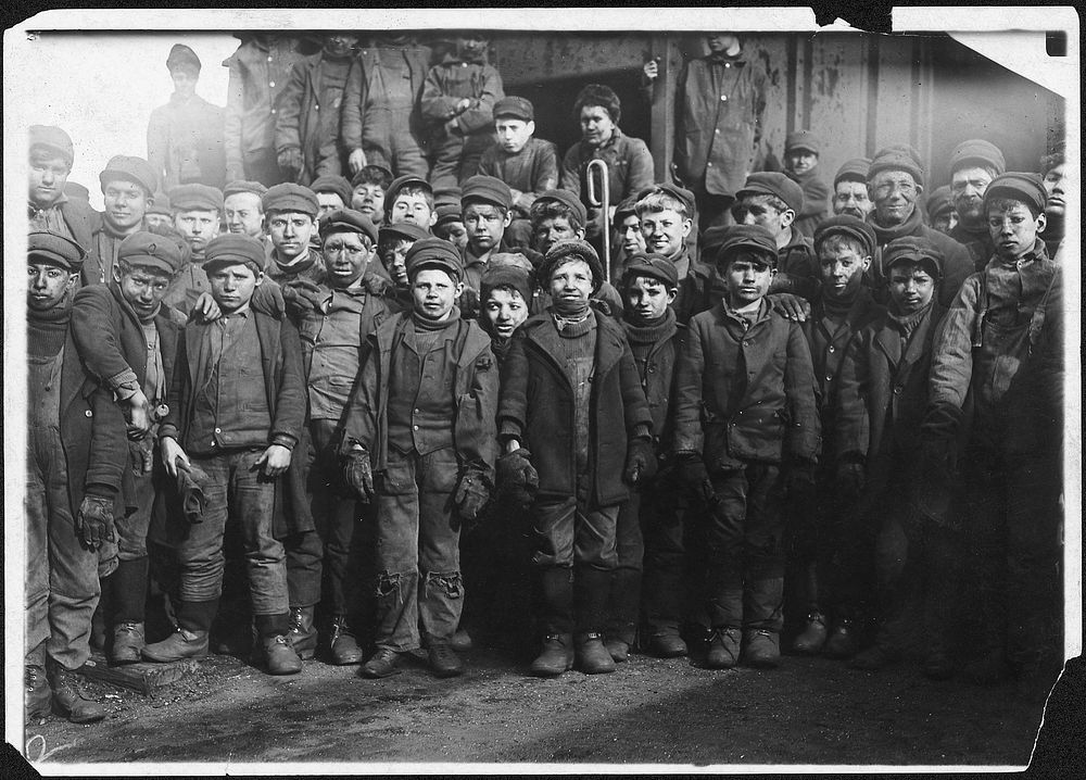 Breaker boys working in Ewen Breaker. S. Pittston, Pa, January 1911. Photographer: Hine, Lewis. Original public domain image…