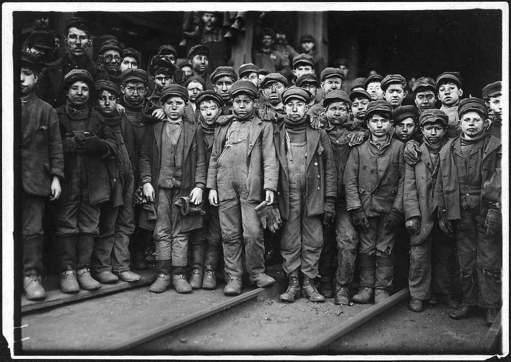 Breaker boys working in Ewen Breaker. S. Pittston, Pa, January 1911. Photographer: Hine, Lewis. Original public domain image…