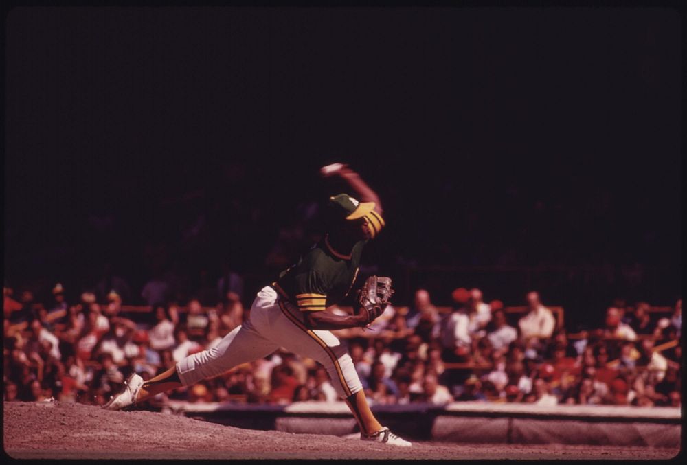 An Oakland A's Pitcher Delivers During A Game With The Home Team Chicago Cubs At Wrigley Field, 07/1973. Photographer:…