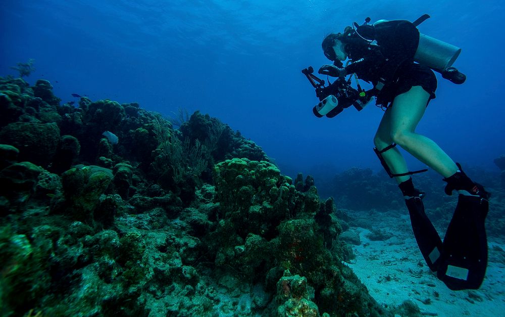 U. S. Navy Petty Officer 2nd Class Kathleen Gorby conducts underwater photography training off the coast of Guantanamo Bay…