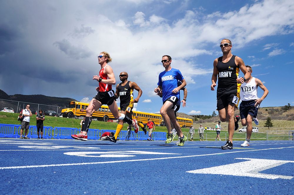 Athletes sprint from the starting line during the men’s open 1,500-meter race as part of the 2013 Warrior Games in Colorado…