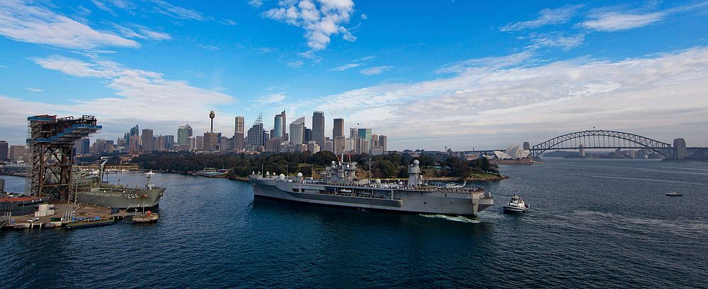 The U.S. 7th Fleet amphibious command ship USS Blue Ridge (LCC 19) approaches the Royal Australian Navy's Fleet Base East on…