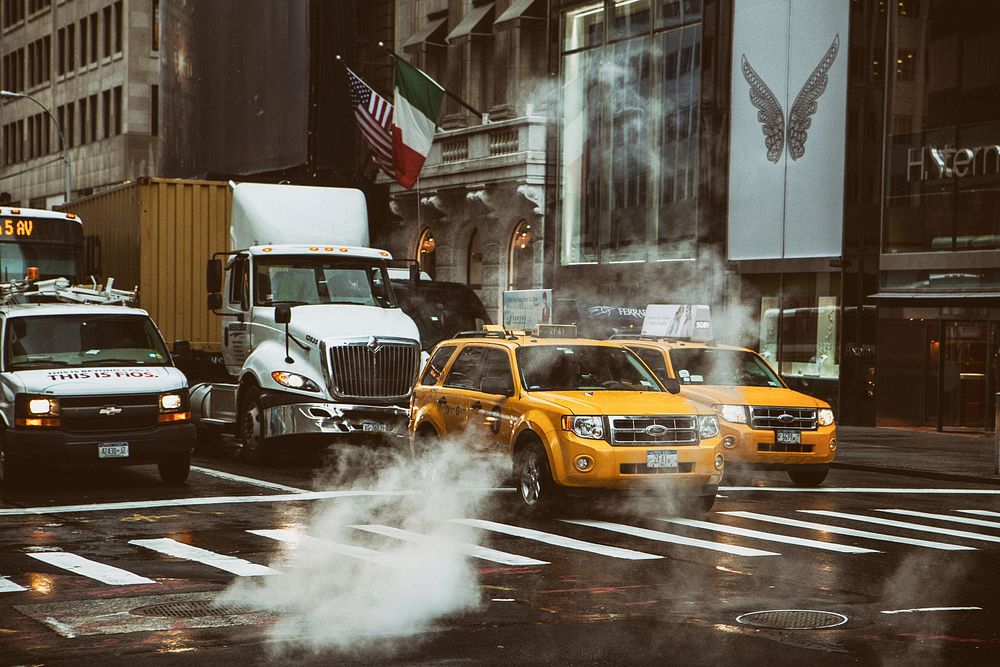 Yellow Cab in New York Street. View public domain image source here