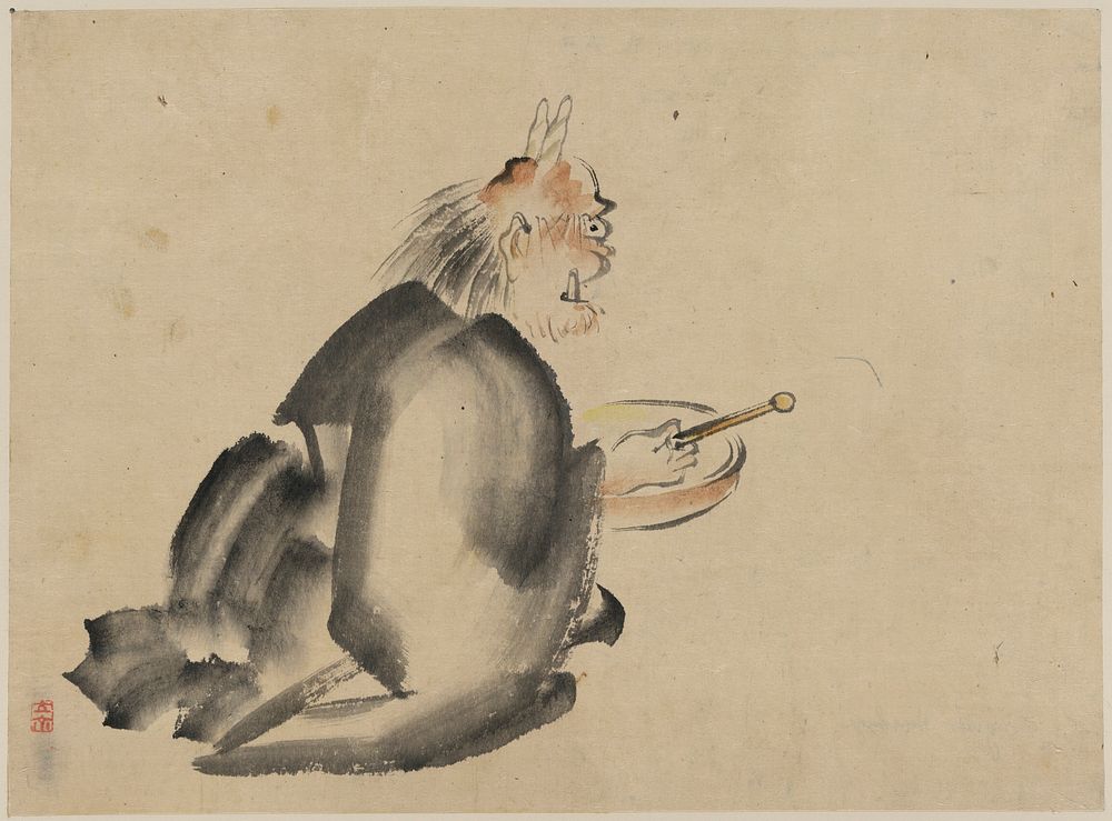 A monk wearing mask(?) with horns, sitting on the ground, beating a drum