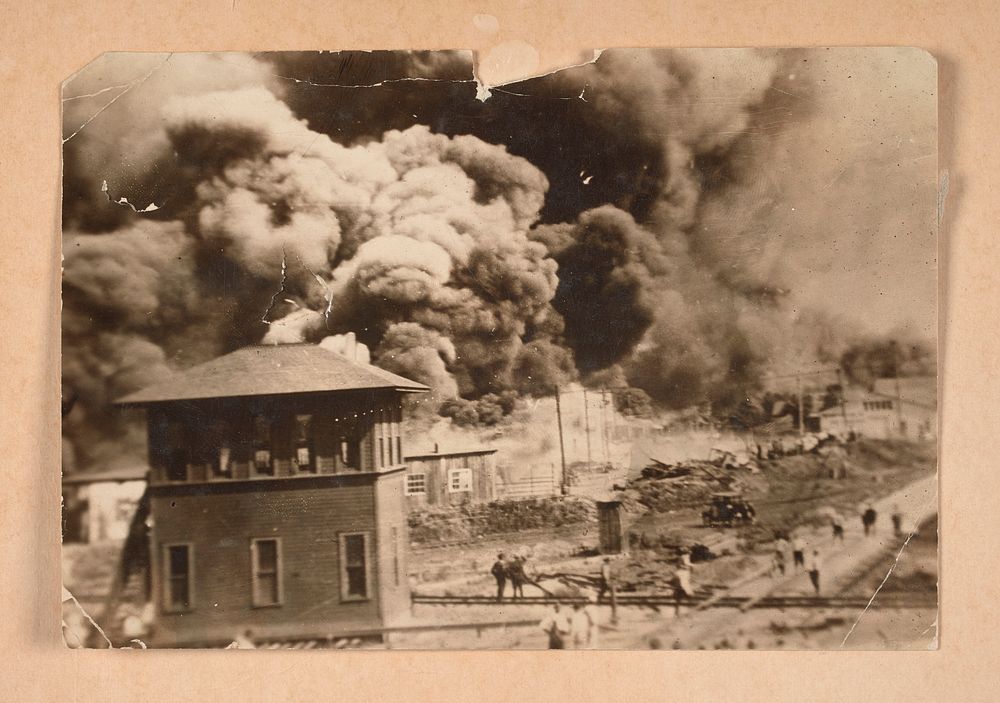 Photograph of the Greenwood District burning during the Tulsa Race Massacre, National Museum of African American History and…