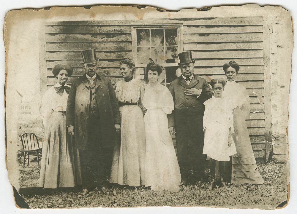 Photograph of the Stevens Family outside their home in Linn Creek, Missouri, National Museum of African American History and…