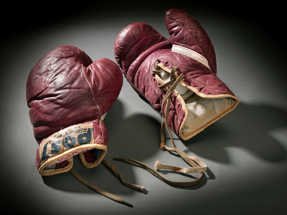 Training boxing gloves used and signed by Cassius Clay, National Museum of African American History and Culture