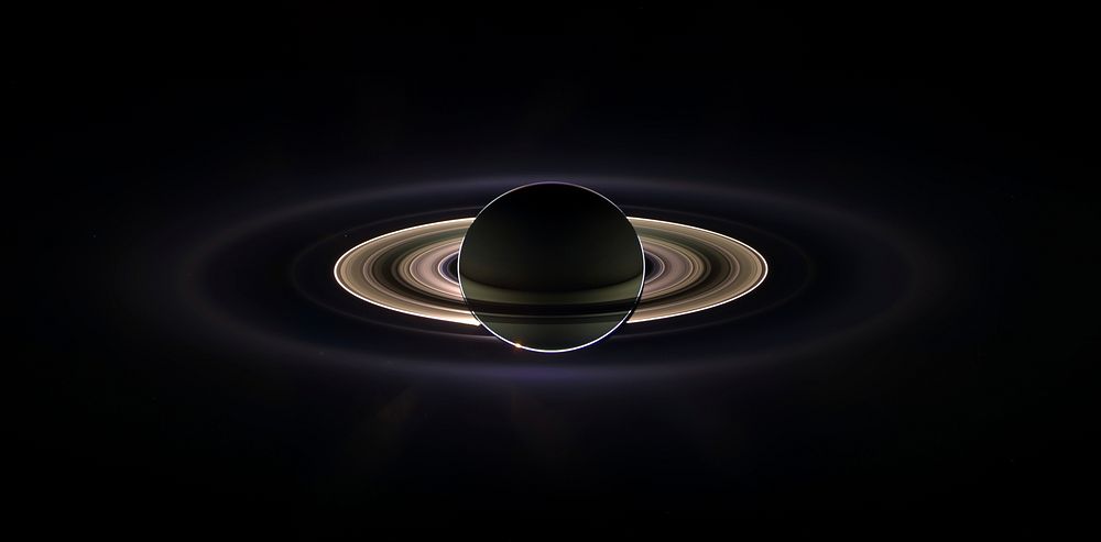 Saturn eclipsing the sun, seen from behind from the Cassini orbiter. The image is a composite assembled from images taken by…