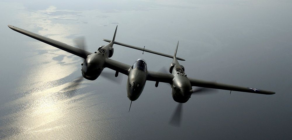 OVER VIRGINIA -- Steve Hinton flies "Glacier Girl," a P-38 Lightning dug out from 268 feet of ice in eastern Greenland in…