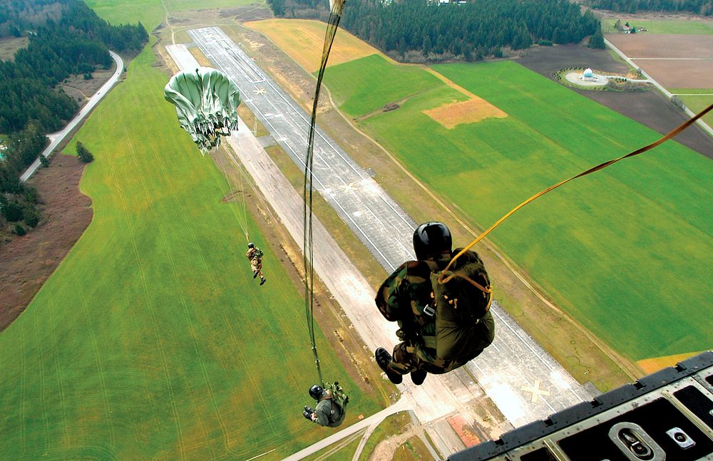 Naval Outlying Field Coupeville: Explosive Ordnance Disposal Mobile Unit Eleven (EODMU-11) members perform a static jump…