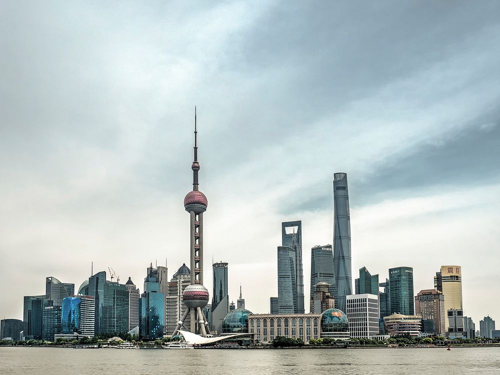 View towards the Shanghai skyline and waterfront in Pudong with the new Shanghai tower.