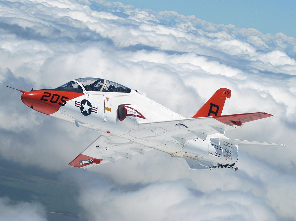 A T-45A Goshawk executes a turning rejoin during a recent formation flight over South Texas. The T-45 is a twin-seat, single…