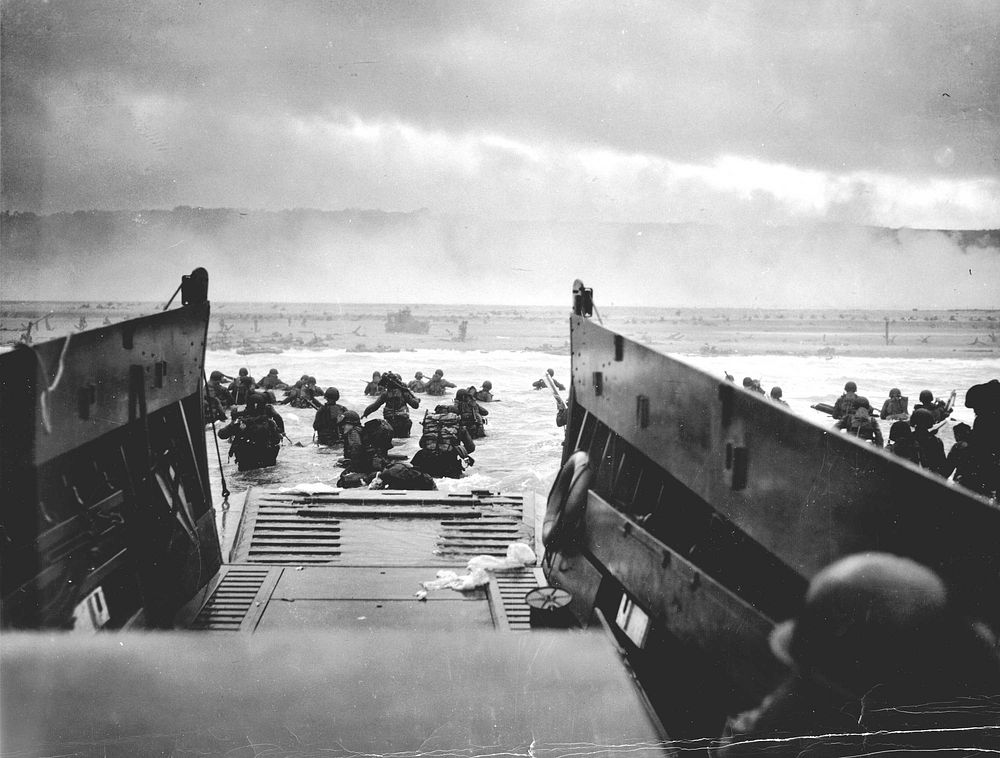 A LCVP (Landing Craft, Vehicle, Personnel) from the U.S. Coast Guard-manned USS Samuel Chase disembarks troops of the U.S.…