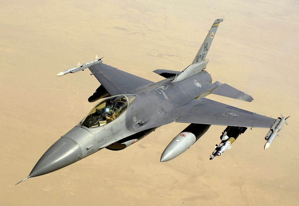 A U.S. Air Force F-16 Fighting Falcon Block 40 aircraft after receiving fuel from a KC-135 Stratotanker aircraft during a…