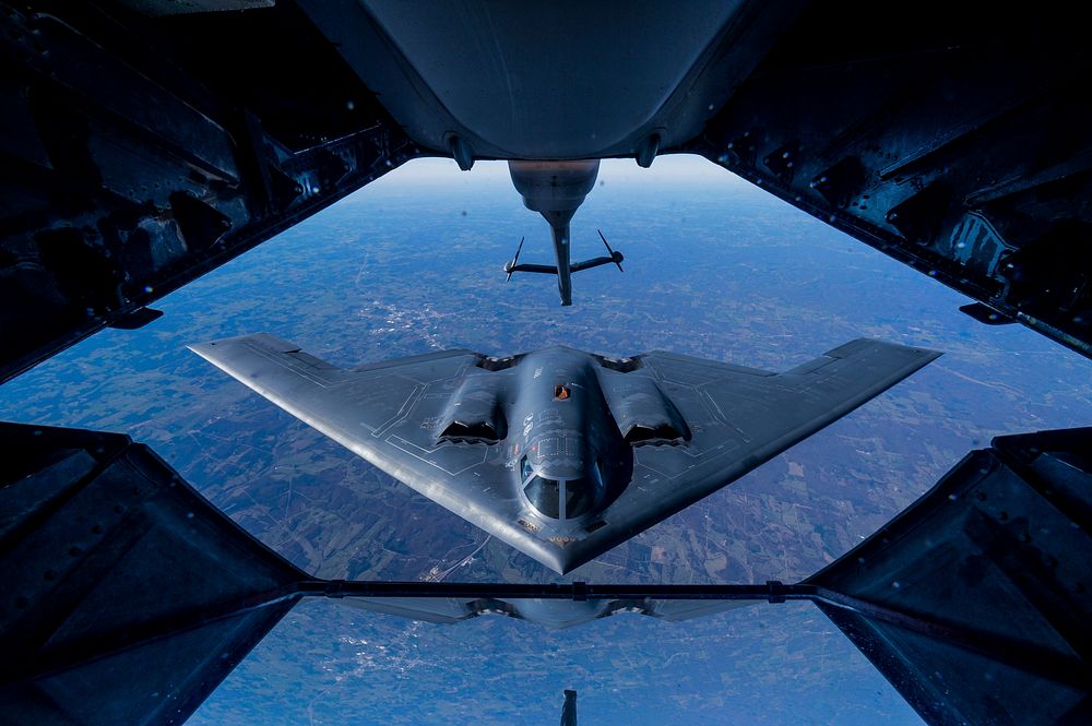 A 2nd Air Refueling Squadron KC-10 Extender from Joint Base McGuire-Dix-Lakehurst, N.J., prepares to refuel a B-2 Spirit…