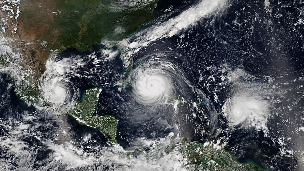 Satellite image of Hurricane Katia (left) making landfall over the Mexican state of Veracruz, Hurricane Irma (center)…