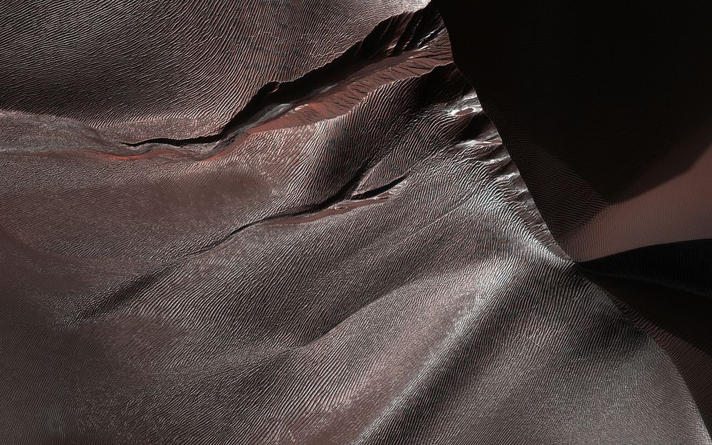 Gullies on Martian sand dunes, like these in Matara Crater, have been very active, with many flows in the last ten years.…