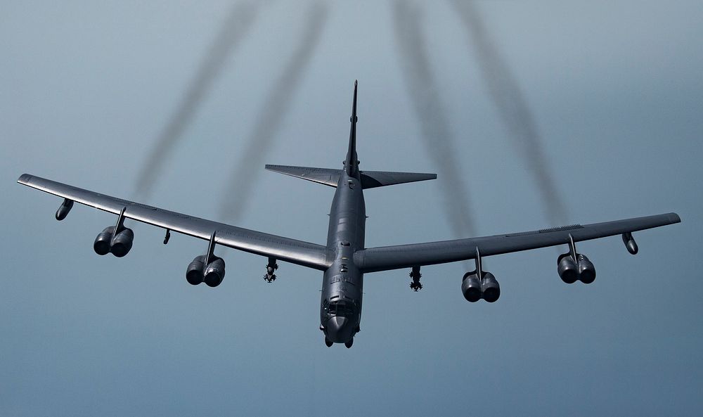 A U.S. B-52H Stratofortress prepares to join with Qatar Emiri Air Force Mirage 2000s and U.S. F-35A Lightning IIs to fly in…