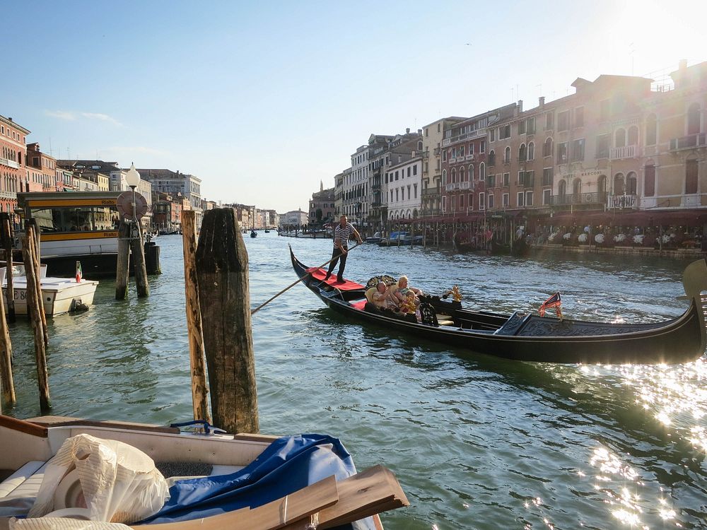 Gondola ride in Venice, Italy. Original public domain image from Travel Coffee Book