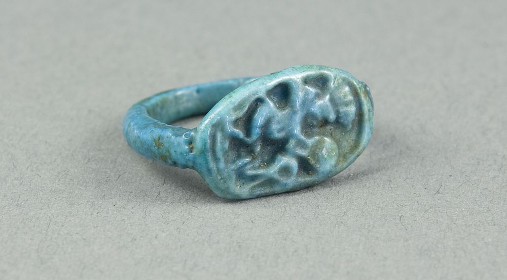 Ring: Figure of Bes playing frame drum, sa (protection) before him by Ancient Egyptian