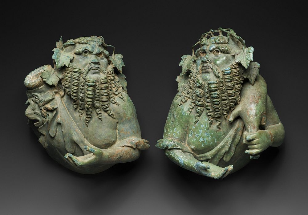 Attachments Depicting Busts of Silenoi by Ancient Roman