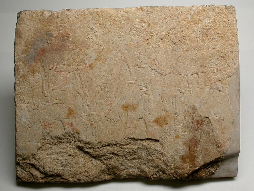 Wall Fragment from a Tomb Depicting Three Offering Bearers by Ancient Egyptian