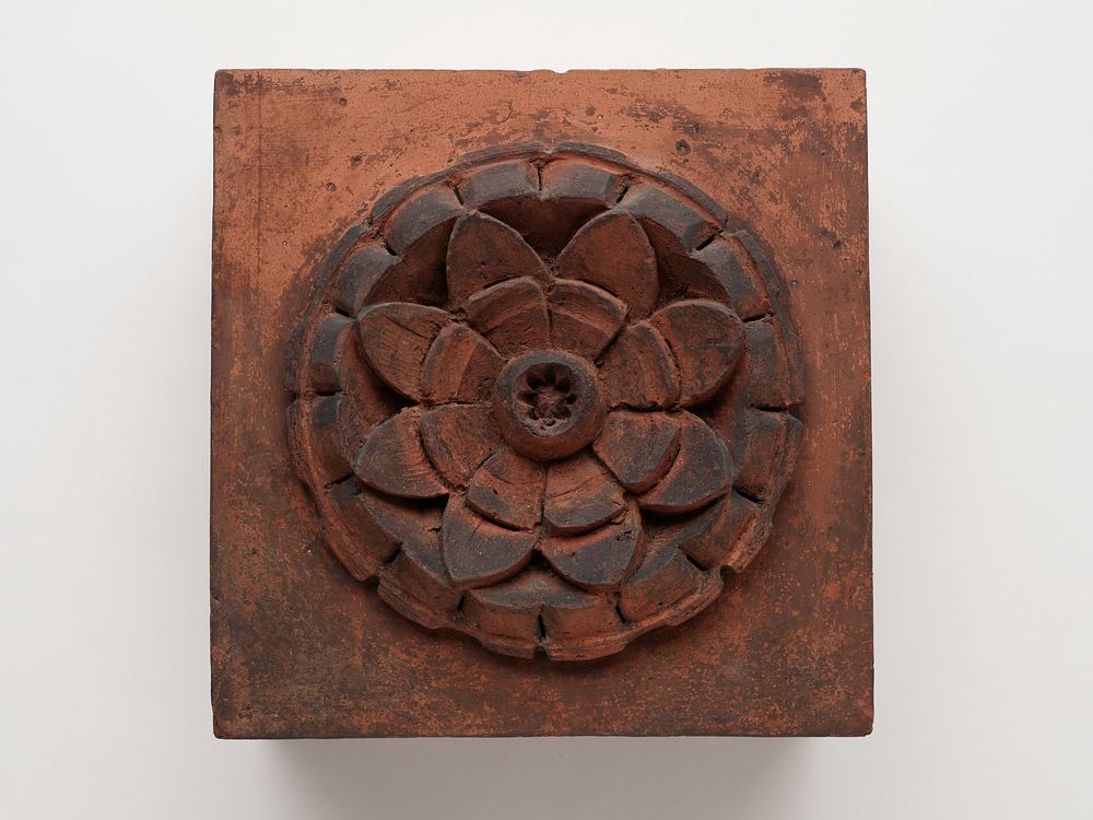 Raymond, E.G., Store and Flats: Rosette Fragment from Facade by Treat & Foltz (Architect)