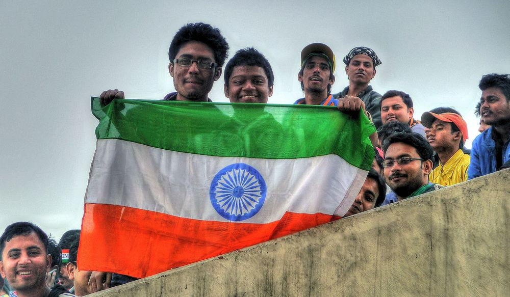 Indian fans share a smile and a wave. Tough, lads, you're going to lose.