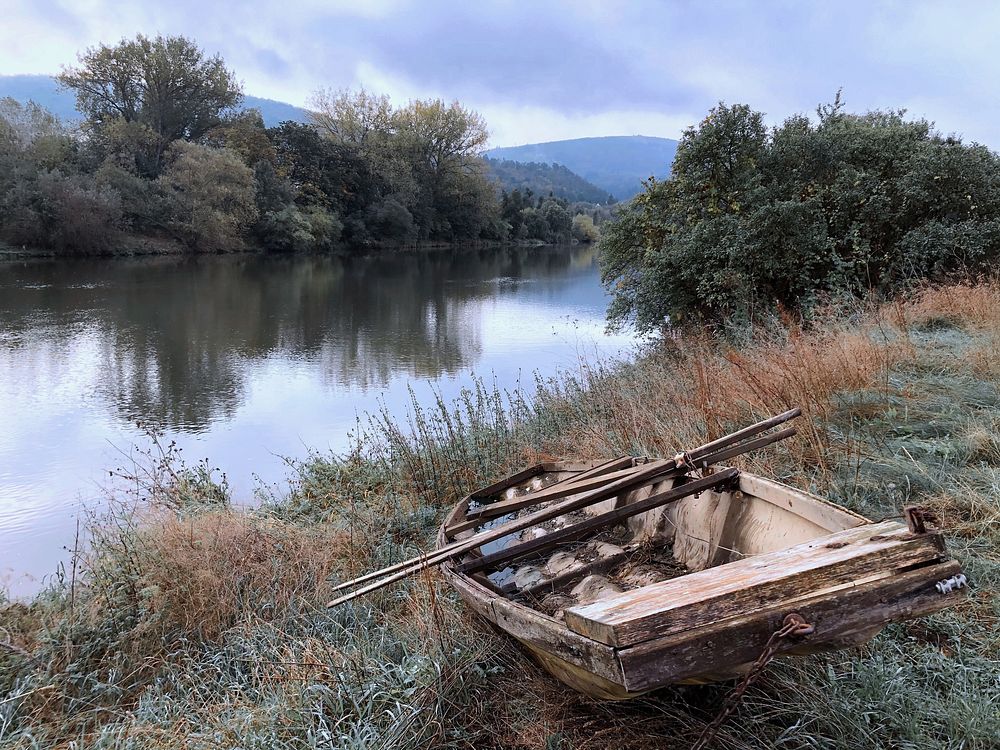 Wooden rowboat, nature lake.