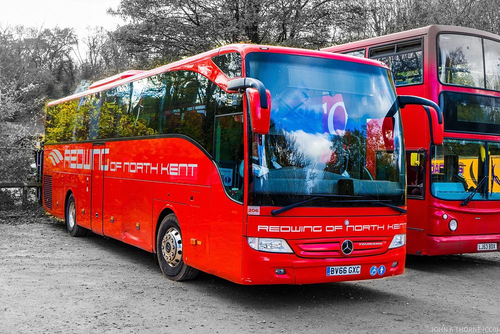 Red tour bus at KENT LIFE.