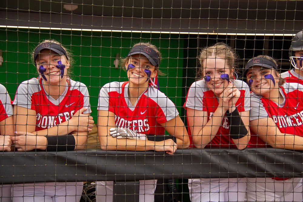 Smiling girl softball players. June 7, 2022.