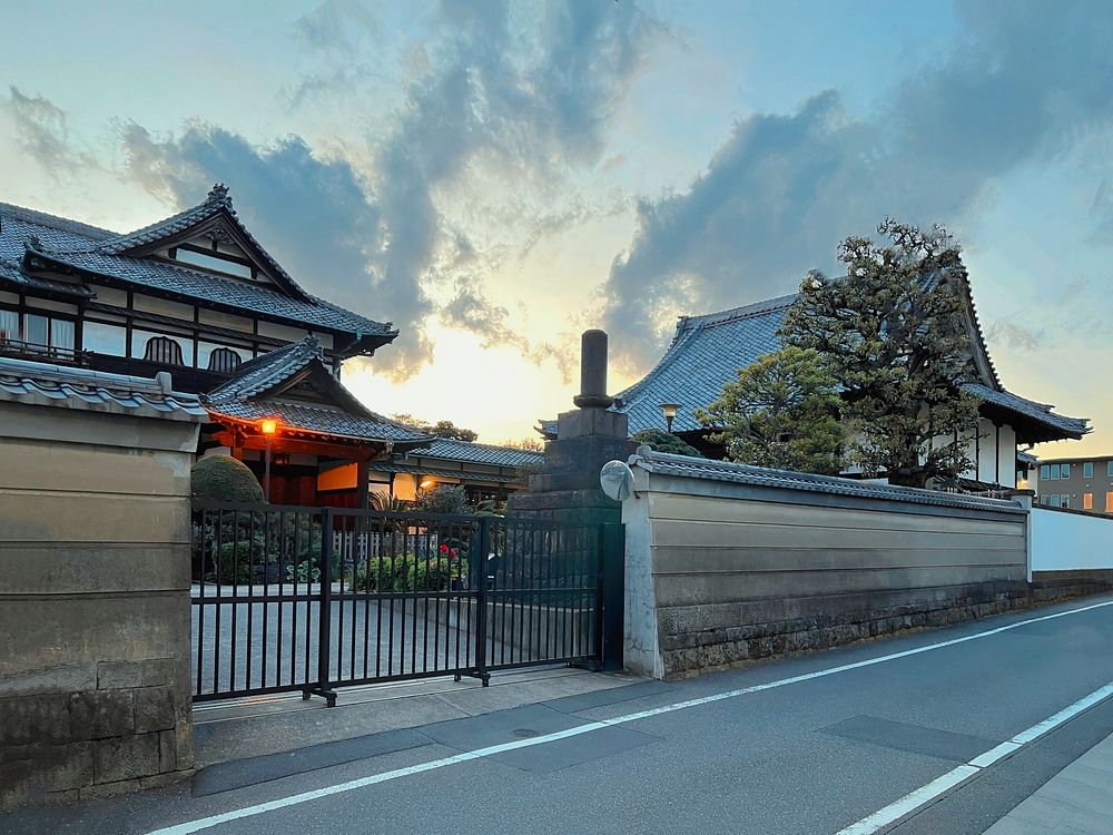 Daihozan Ichijoji Temple, Taito City, Tokyo, JapanThe sun sets behind Daihozan Ichijoji, a Nichiren Buddhist sect temple…